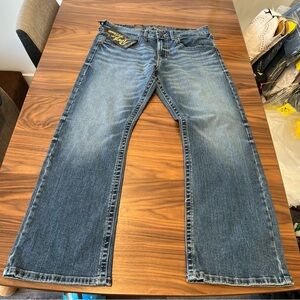 Wrangler Blue Relaxed Jeans with Vintage Wash